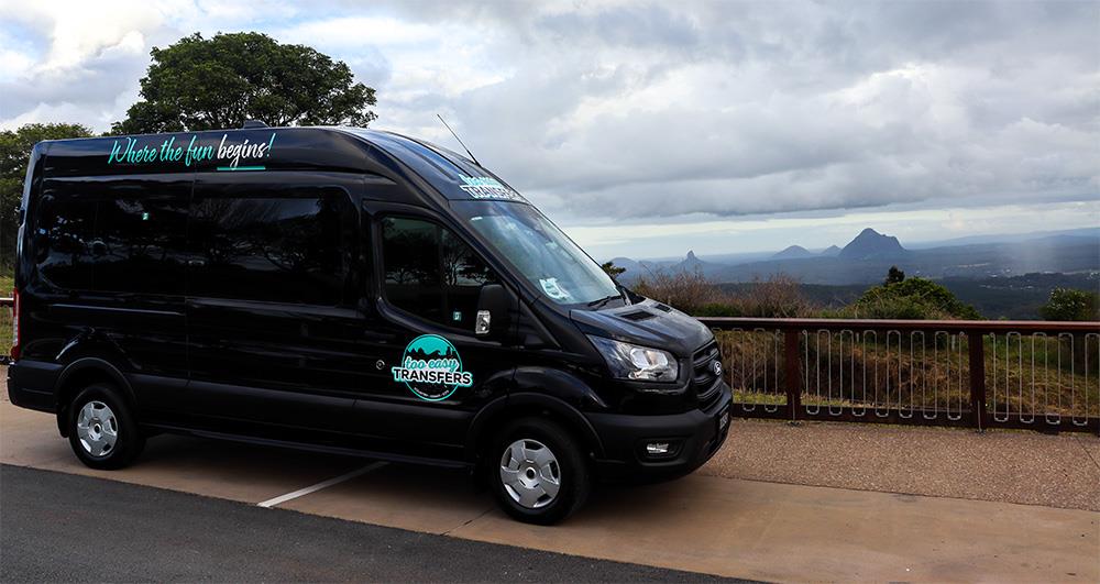 Too Easy Transfers van with the Sunshine Coast mountains as a backdrop